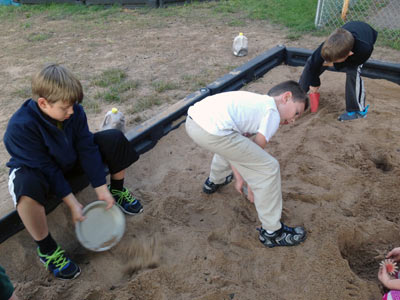 Children Playing in Sandbox